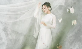 BTV Hoài Anh mơ màng như công chúa với áo dài cách tân