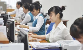 Nhân viên ngân hàng đối mặt nguy cơ thất nghiệp