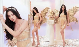 Á hậu Thúy An diện áo tắm xẻ hông cao cực gợi cảm