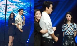 Lưu Diệc Phi 'đơ' khi chứng kiến bạn trai bị fan nữ ôm ấp thân mật. 