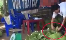 Người đàn ông đổ 'chất lạ' vào mít rồi đem bán