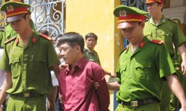 Áp giải Vũ Văn Luân.