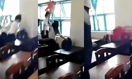 Nữ sinh lớp 7/5 bị đánh hội đồng. Ảnh cắt ra từ clip.