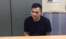 Nguyễn Trung Hậu tại cơ quan công an.