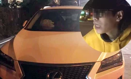 Chiếc ô tô và nam tài xế. Ảnh V.H