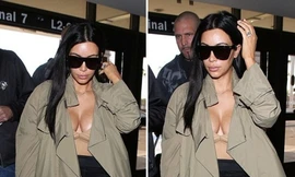 Kim 'siêu vòng ba' diện đồ hở bạo tại sân bay