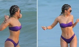 Em gái cô Kim khoe dáng nuột với bikini trên bãi biển