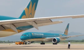 Vietnam Airlines chính thức thông qua phương án phát hành cổ phiếu để tăng vốn thêm 8.000 tỷ đồng, vay Chính phủ 4.000 tỷ đồng và kêu gọi các cổ đông khác cùng cho vay. Ảnh: Phạm Thanh