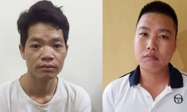 Thám và Đại (từ trái sang phải) tại cơ quan công an