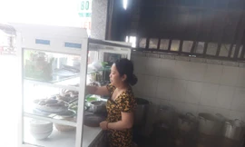 Chủ quán ăn trả túi xách có sổ tiết kiệm 550 triệu đồng của khách để quên