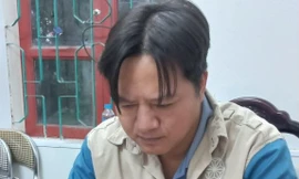 Đối tượng Long tại cơ quan công an .Ảnh: CB