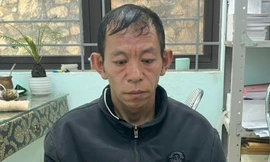 Đối tượng Giàng Mí Cấu tại cơ quan công an.