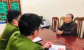 Đối tượng Đinh Thị Thảo tại cơ quan công an -Ảnh: TL