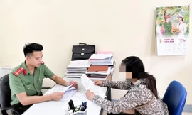 Bà Q tại cơ quan công an. Ảnh: CB