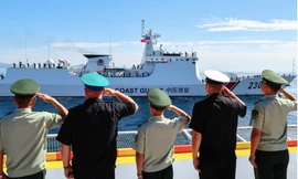 Tàu của Hải cảnh Trung Quốc tham gia cuộc tập trận chung trên Vịnh Peter Đại đế ngày 18/9. (Ảnh: Tass)