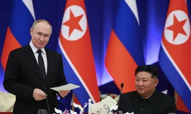 Tổng thống Nga Vladimir Putin và Chủ tịch Triều Tiên Kim Jong Un tại tiệc chiêu đãi ở Bình Nhưỡng ngày 19/6. (Ảnh: Sputnik)