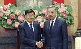 Tổng Bí thư, Chủ tịch nước Tô Lâm tiếp Tổng Bí thư, Chủ tịch nước Lào Thongloun Sisoulith ngày 25/7. (Ảnh: TTXVN) 