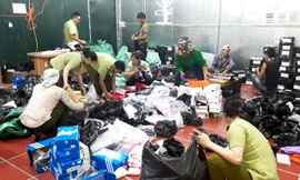 Ông Nguyễn Kỳ Minh, Phó Chánh Văn phòng Tổng cục Quản lý thị trường trả lời phỏng vấn báo chí chiều 23/7. Ảnh: Tuấn Nguyễn