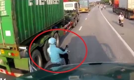 Nữ ‘ninja’ vượt ẩu, tạt đầu xe container trên quốc lộ 5