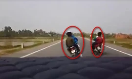 VIDEO: Thanh niên làng đánh võng lượn lờ thách thức ô tô