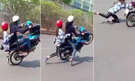 Clip: Quái xế bốc đầu xe máy khi chở bạn gái và cái kết đắng