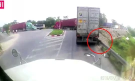 Đứng đúng điểm mù khi chờ đèn đỏ, cô gái may mắn thoát nạn