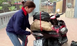 'Nữ hoàng nhảy xa' Bùi Thị Thu Thảo bán khoai lang lo Tết