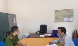 Tài xế Trịnh Xuân Hòa tại cơ quan công an.