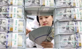 Trung Quốc giảm lượng trái phiếu chính phủ Mỹ trong 6 tháng liên tục. (Ảnh: EPA-EFE)