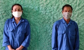 Phạm Thị Tỵ và Lê bá Thắng tại cơ quan công an