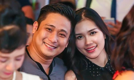 Minh Tiệp và vợ thân mật khi cùng tham gia một sự kiện.