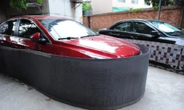 Dân Trung Quốc mặc 'váy' cho xe ôtô để chống chuột