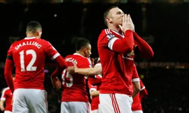 Rooney ăn mừng bàn thắng thứ ba cho Man Utd. Ảnh: Reuters.