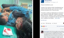 Bức ảnh mẹ cho con bú dù đang bị thương nặng gây xúc động cho nhiều người. Ảnh: Bangkok Post.