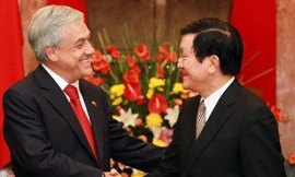 Chủ tịch nước Trương Tấn Sang (phải) và Tổng thống Chile Sebastián Piđra Echenique Ảnh: TTXVN