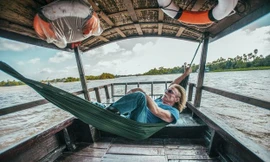 Christophe trên sông Mê Kông