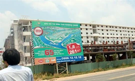 Hướng tới căn hộ có giá trung bình là giải pháp cho nhiều doanh nghiệp bất động sản. Trong ảnh: một dự án cho người thu nhập thấp tại Bình Dương - Ảnh: Đ.DÂN