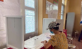 Người dân thực hiện quyền bầu cử tại xã Đồng Tâm. Ảnh: N.T