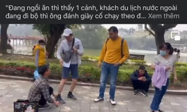 Tự ý gắn keo vào giày du khách ở hồ Gươm, người đàn ông bị phạt 2 triệu đồng