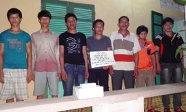 7 thanh niên cùng số tang vật bị BĐBP Quảng Bình bắt giữ.