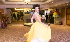 Ngọc Diễm lưng trần sexy tung bay váy