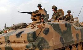 Lực lượng Thổ Nhĩ Kỳ tiến hành cuộc tập trận đầu tiên tại căn cứ quân sự Tariq bin Ziyad vào Chủ Nhật (18/6). Ảnh: EPA