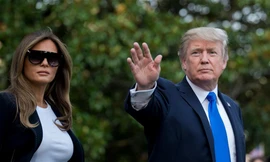Ông Trump và vợ chào tạm biệt mọi người trước khi rời Nhà Trắng sang Pháp. Ảnh: Tân Hoa Xã