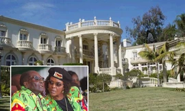 Tổng thống Zimbabwe Robert Mugabe và vợ Grace Mugabe nhiều khả năng đang bị giam lỏng tại nhà riêng. 
