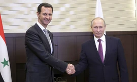 Tổng thống Nga Vladimir Putin gặp người đồng cấp Syria Bashar Assad tại Sochi hôm 20/11. Ảnh: Reuters