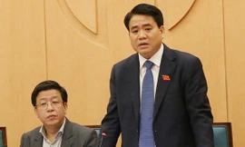 Người dân Hà Nội đang phải sống trong ô nhiễm không khí ảnh: p.v