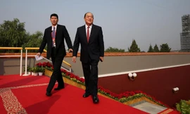 Ông Hạ Nhất Thành (phải) có mặt ở Bắc Kinh dịp kỷ niệm quốc khánh Trung Quốc vừa quaẢnh: Reuters 