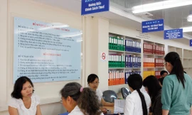 Làm thủ tục quyết toán thuế thu nhập cá nhân tại Cục Thuế TPHCM Ảnh: GDT