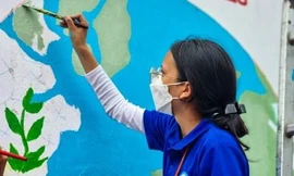 ‘Thay áo’ cho những bức tường, cột điện