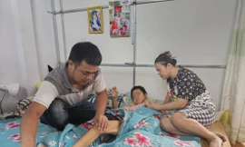 Em U. bị thương tật nằm một chỗ